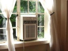 Fenster Conditioner: das Prinzip der Operation, Vor- und Nachteile